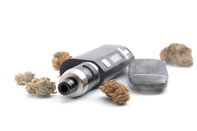 cannabis next to a vaporizer 
