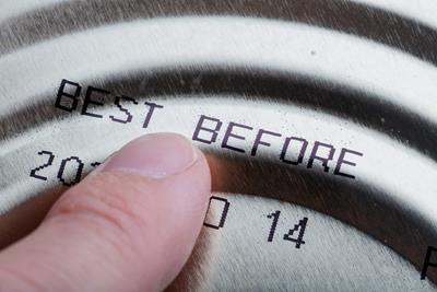 Image of a best before expiration date on a tin can, symbolizing shelf life