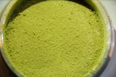 a grinder filled with kief